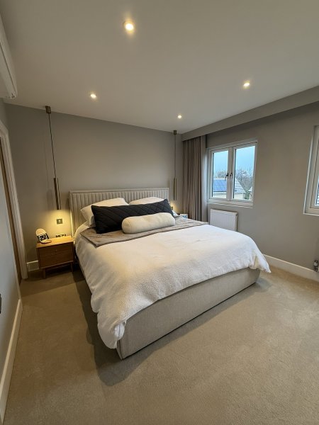 Bedroom and en-suite dormer loft conversion by J&T Herbert Loft Conversions Ltd 