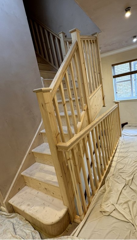 Feature wooden staircase for conversion by J&T Herbert Loft Conversions Ltd - Buckinghamshire