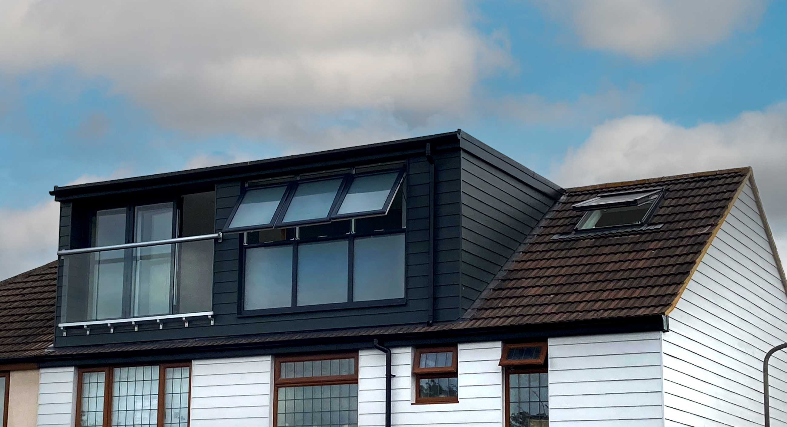 Hip to gable loft converison with rear dormer and Velux window